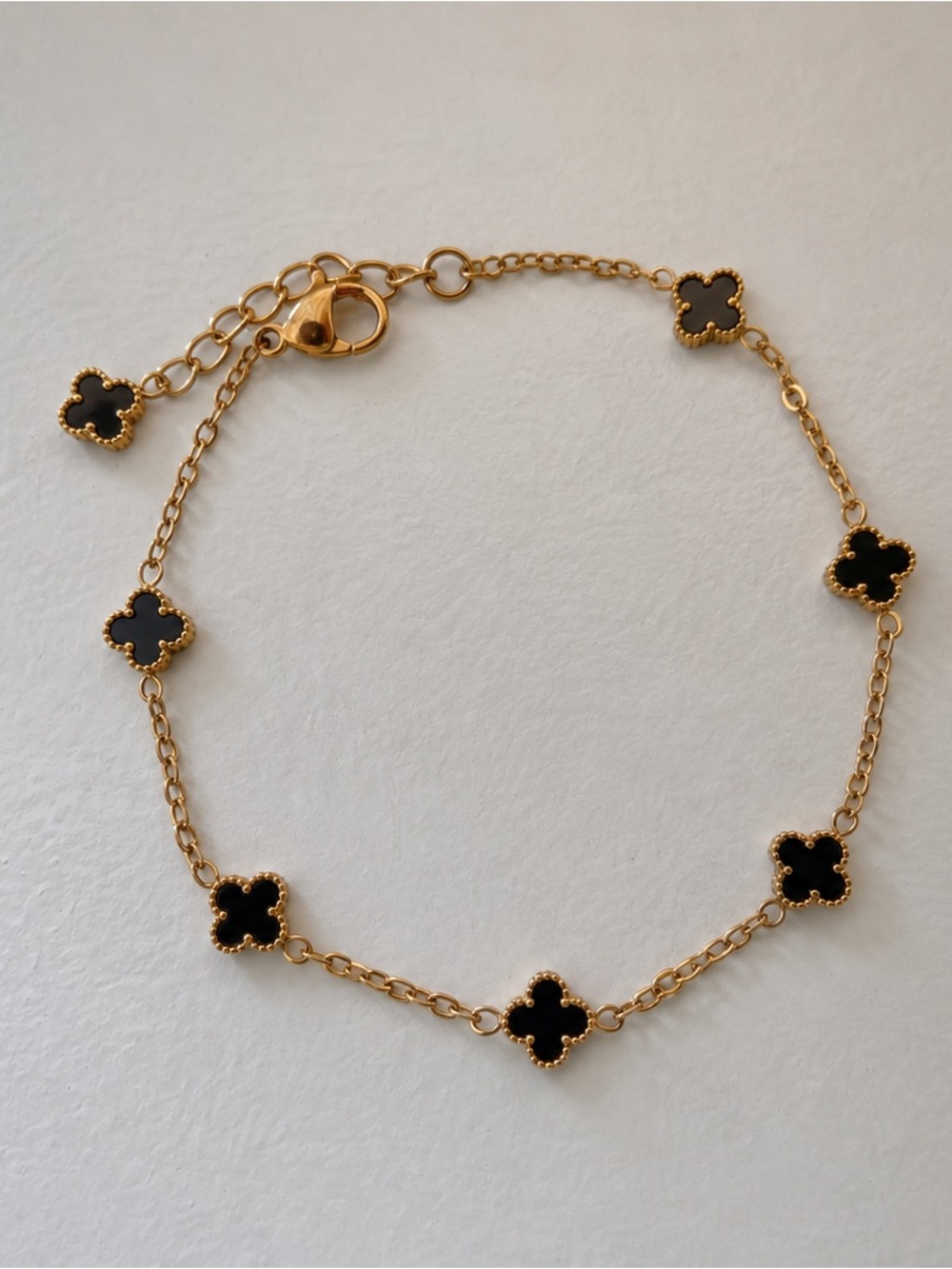 18k gold pvd stainless steel black floral motif dainty bracelet